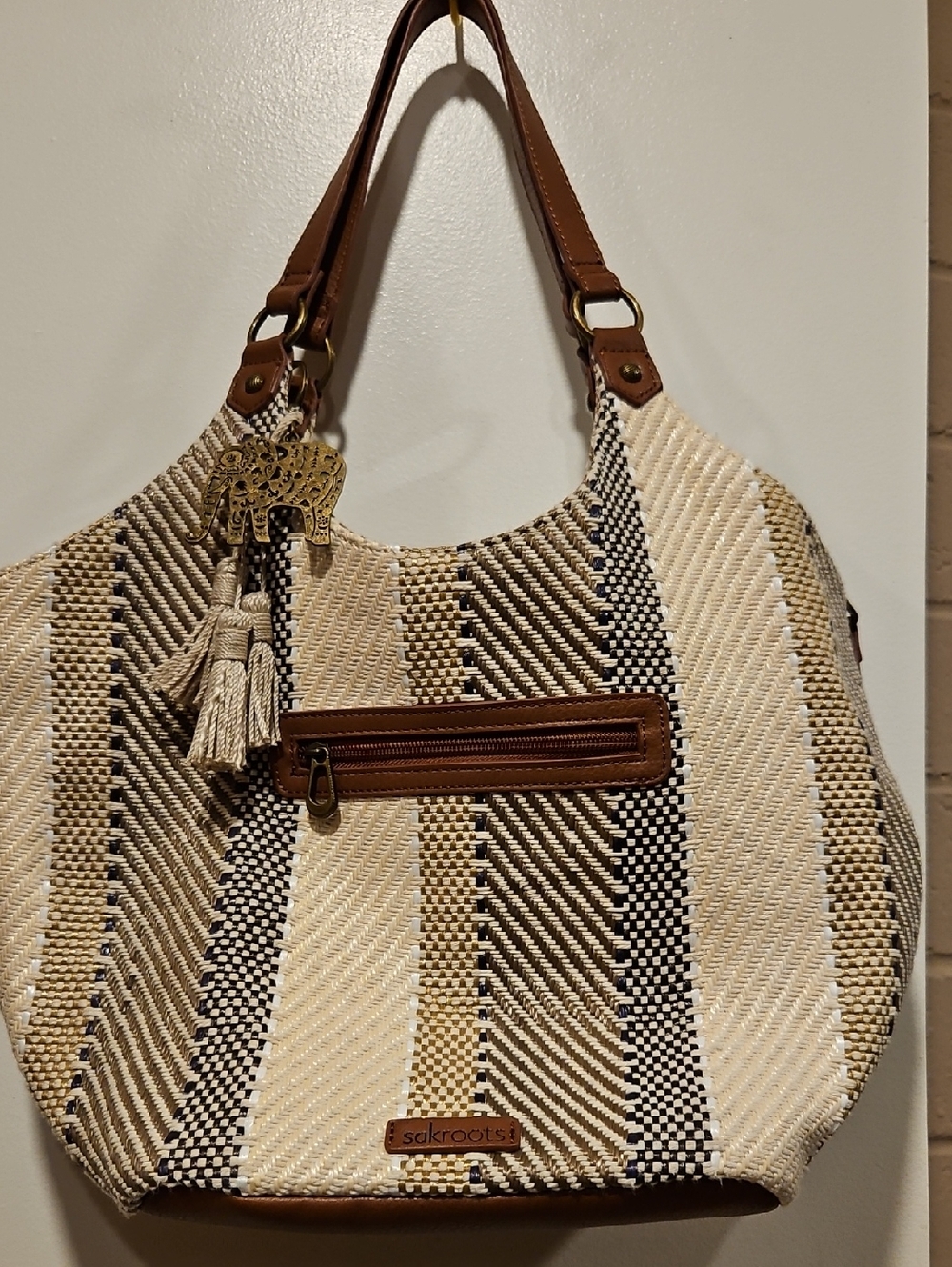 Sakroots Neutral Woven Stripe Shoulder Bag with Tassel and Elephant Charm